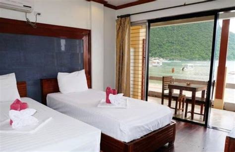 el nido beach hotel website.